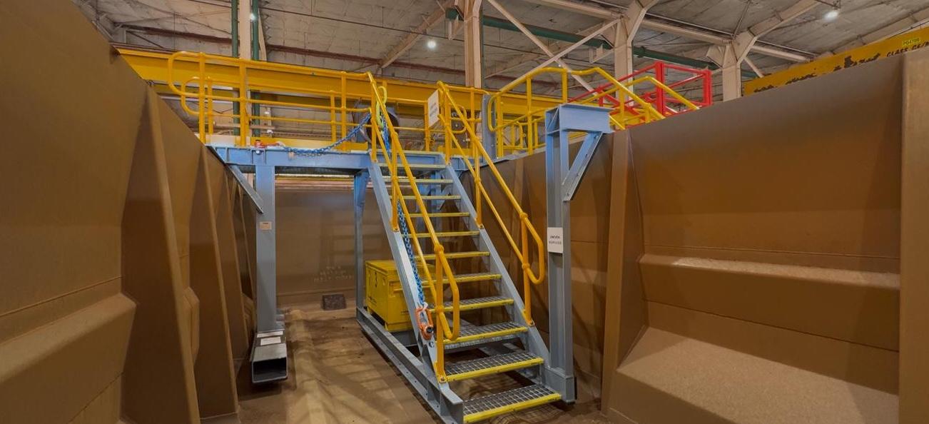 The completed access and egress platform installed over the wagons